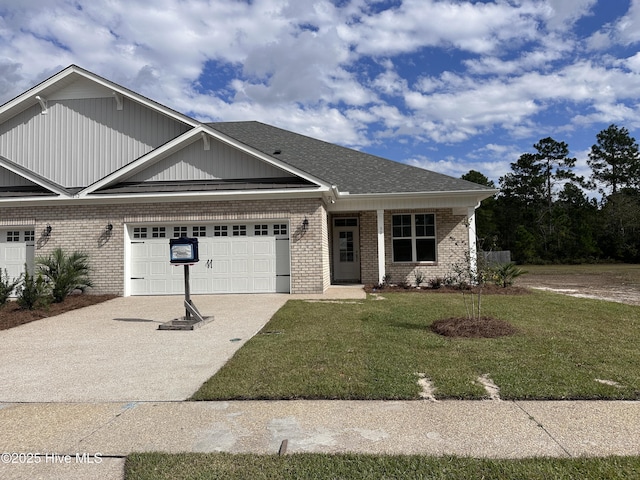 craftsman-style home with a front lawn and a garage