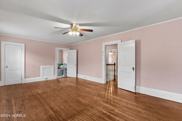 unfurnished bedroom featuring hardwood / wood-style floors, ensuite bathroom, ceiling fan, and ornamental molding