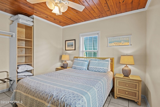 bedroom with ceiling fan, ornamental molding, light tile patterned floors, and wooden ceiling