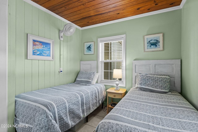 tiled bedroom featuring crown molding, wooden ceiling, and wood walls