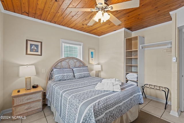 tiled bedroom with crown molding, wooden ceiling, and ceiling fan