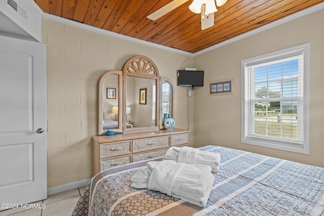 bedroom featuring ceiling fan, crown molding, and wood ceiling