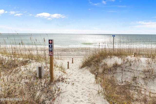 property view of water with a beach view