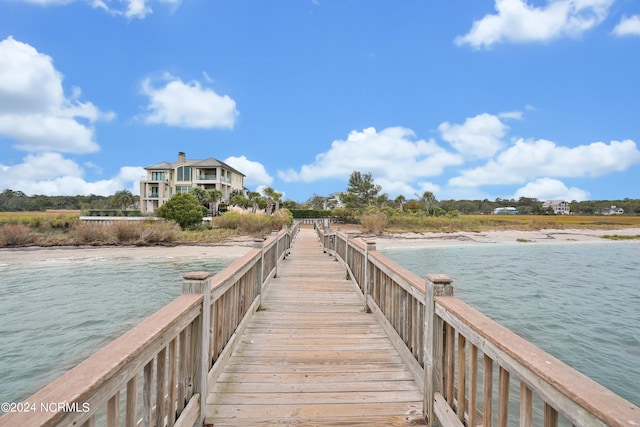 dock area with a water view