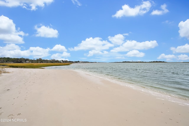 view of water feature with a beach view