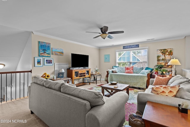 living room featuring ceiling fan, ornamental molding, and light carpet