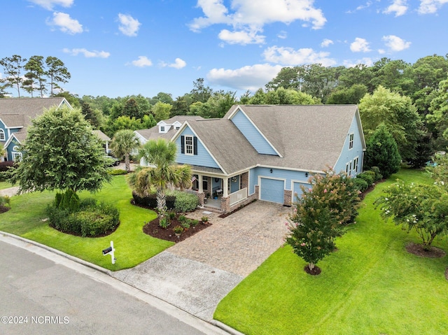 view of front of house featuring a porch and a front lawn