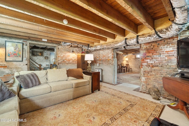 living room with brick wall, beamed ceiling, and wood ceiling