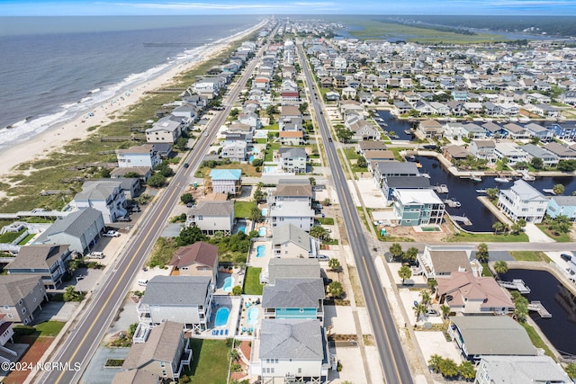 aerial view with a beach view and a water view