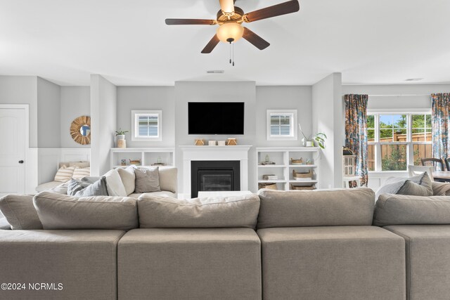 living room featuring ceiling fan