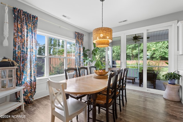 dining space featuring dark hardwood / wood-style floors and ceiling fan