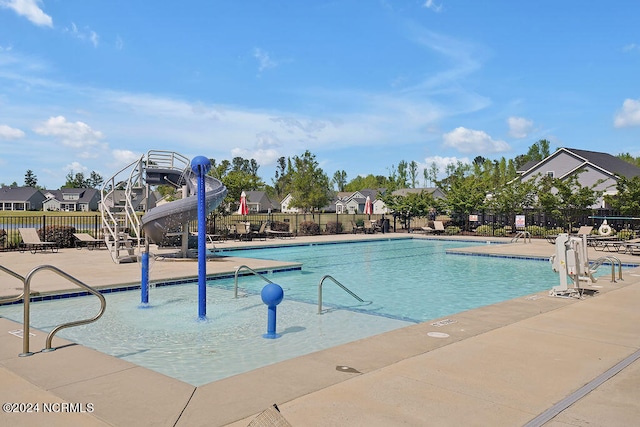 view of swimming pool featuring a patio area