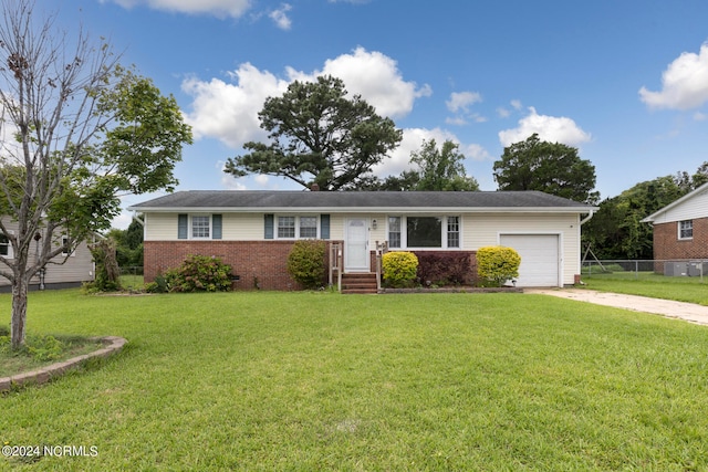 single story home with a garage and a front yard