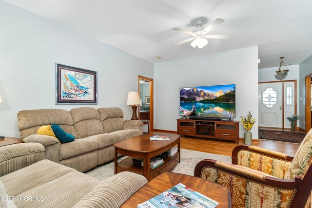 sitting room featuring light hardwood / wood-style floors