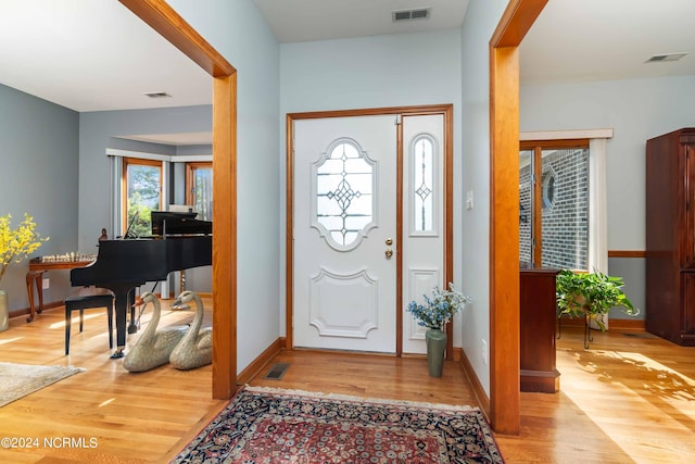 entryway with visible vents and light wood-style floors