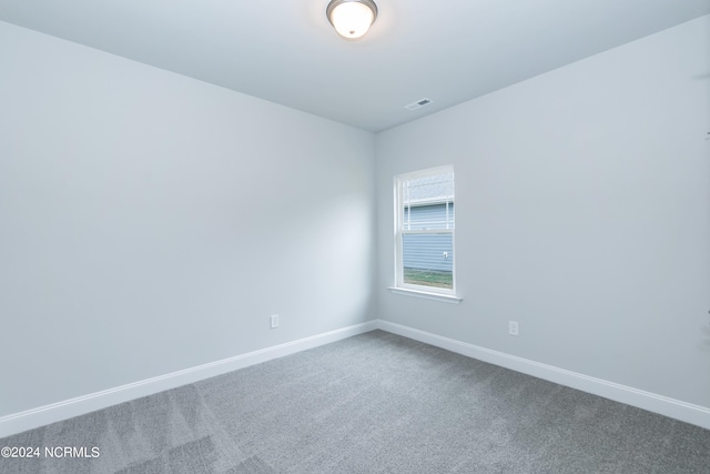 spare room with carpet flooring