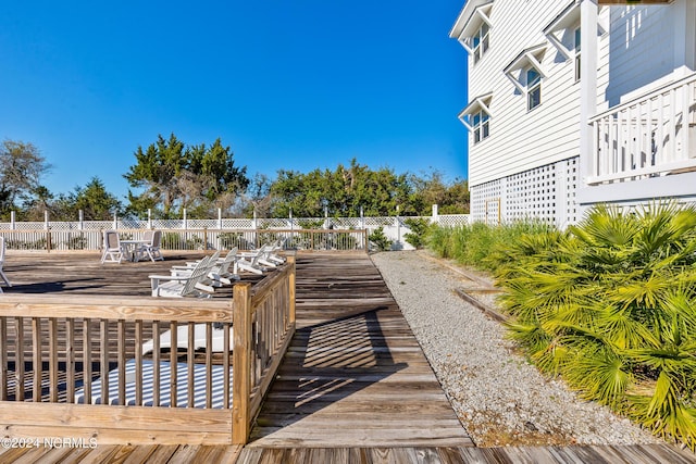 exterior space featuring a wooden deck