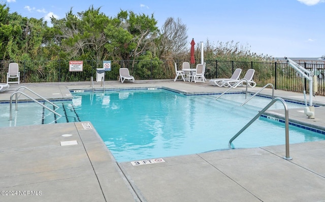 view of pool with a patio area