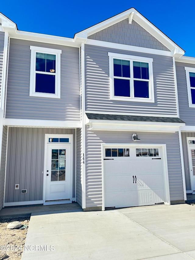 view of front of property featuring a garage