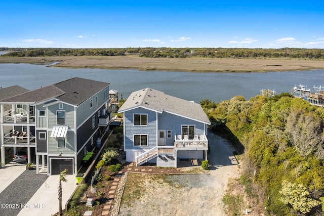 bird's eye view with a water view