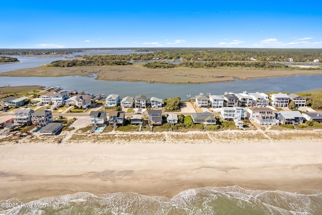 bird's eye view featuring a water view and a residential view