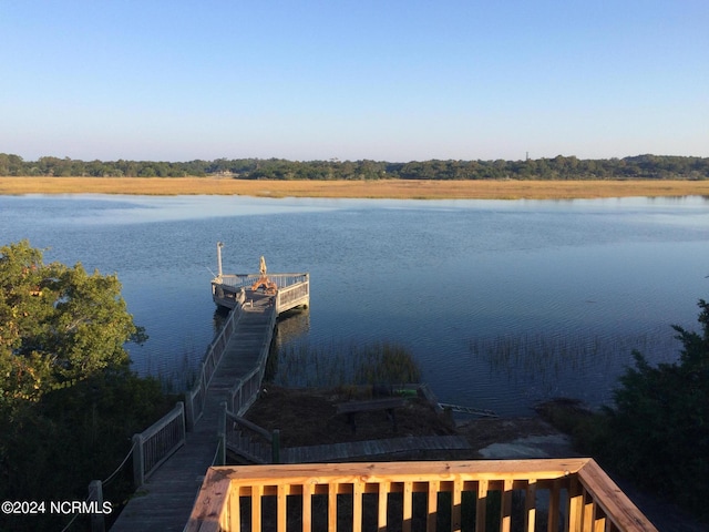dock area with a water view
