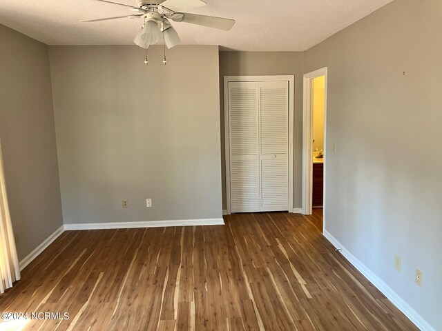 unfurnished room with plenty of natural light, ceiling fan, and hardwood / wood-style floors