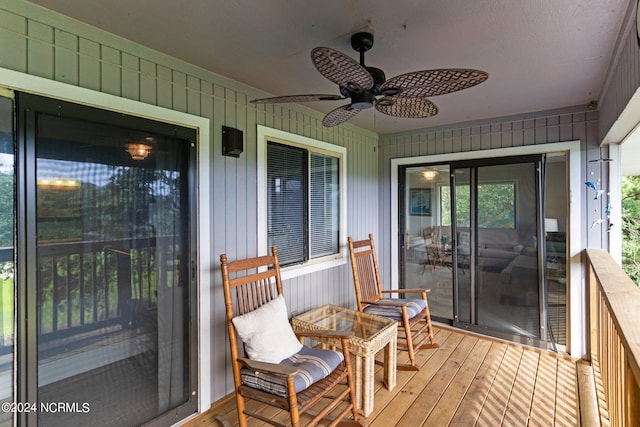 wooden deck with ceiling fan