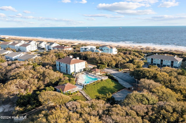 birds eye view of property featuring a water view and a residential view