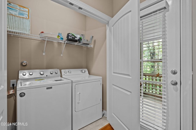 laundry room featuring laundry area and washing machine and dryer