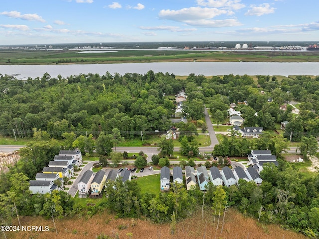 bird's eye view with a residential view and a water view