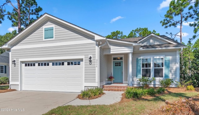 view of front of property featuring a garage