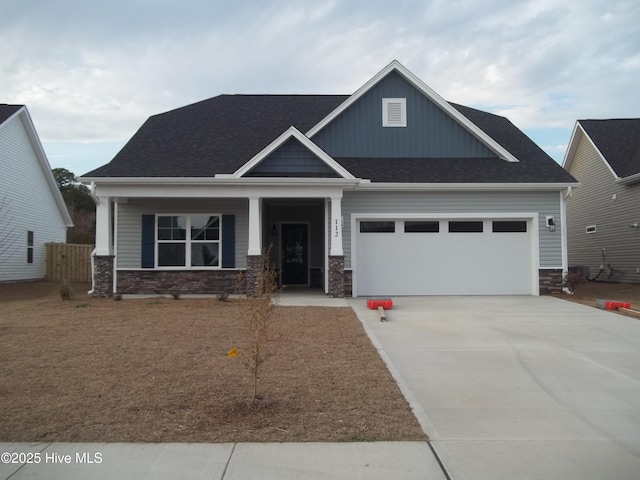 craftsman house featuring a garage and covered porch