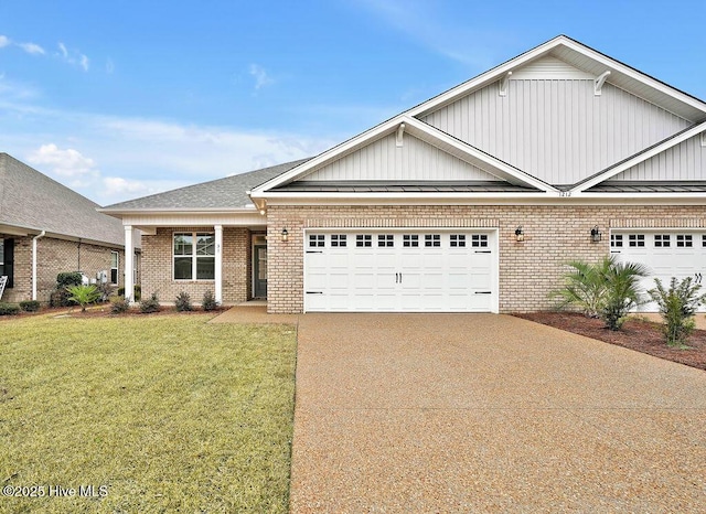 craftsman-style home featuring a garage and a front yard