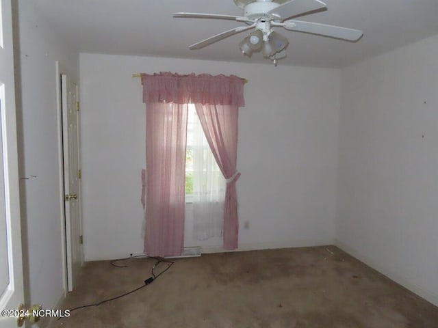 bathroom featuring a stall shower, visible vents, baseboards, and wallpapered walls