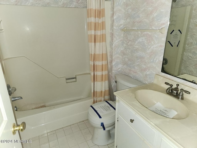 full bathroom with vanity, tile patterned flooring, shower / bath combination with curtain, and toilet