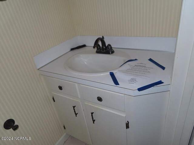 103 Creekview Ln, Washington, NC 27889 - bathroom with wallpapered walls and vanity