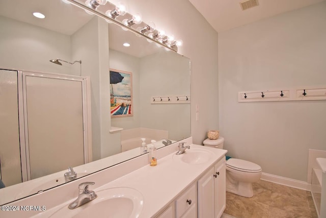 bathroom featuring a bath, a stall shower, visible vents, and a sink