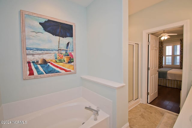 bathroom with ceiling fan, wood-type flooring, and independent shower and bath