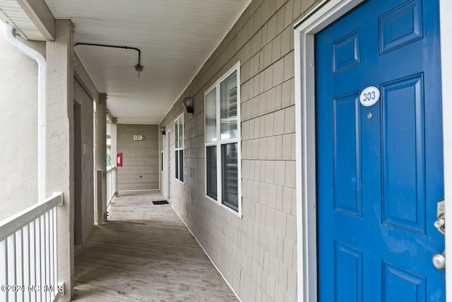 doorway to property with covered porch