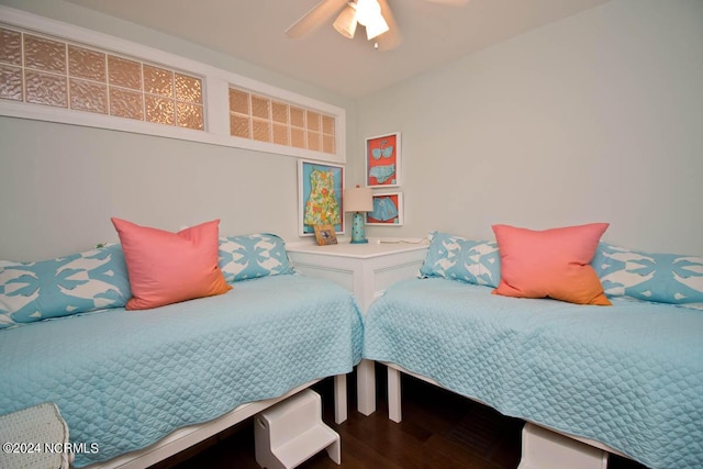 bedroom with ceiling fan and wood finished floors