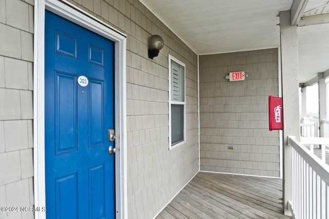 property entrance with a porch