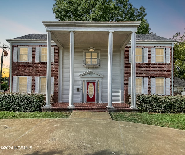 greek revival house with a porch