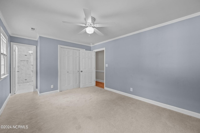 unfurnished bedroom featuring a closet, ceiling fan, ornamental molding, and light colored carpet