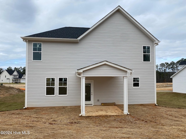 rear view of property with a patio area