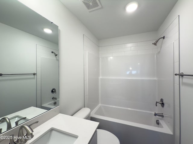 full bathroom with shower / bath combination, vanity, and toilet