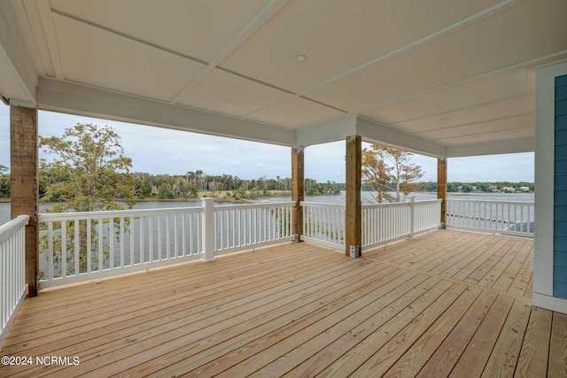 wooden terrace with a water view