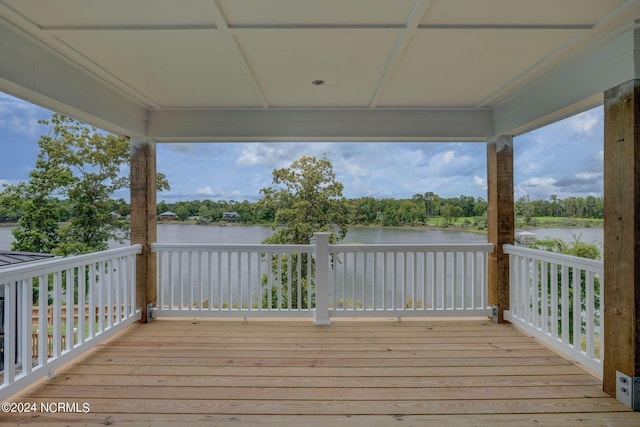 deck featuring a water view