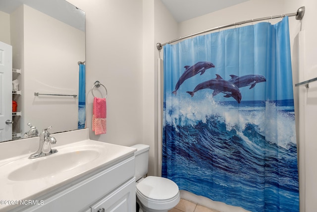 bathroom featuring tile patterned flooring, vanity, toilet, and a shower with shower curtain