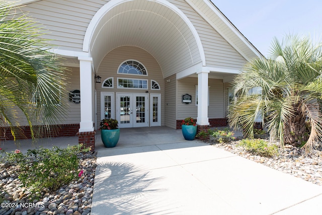 property entrance featuring french doors